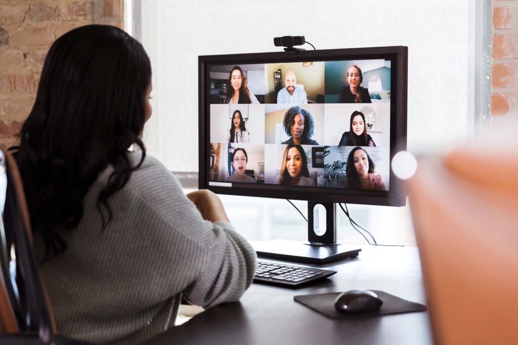 Woman facing computer screen