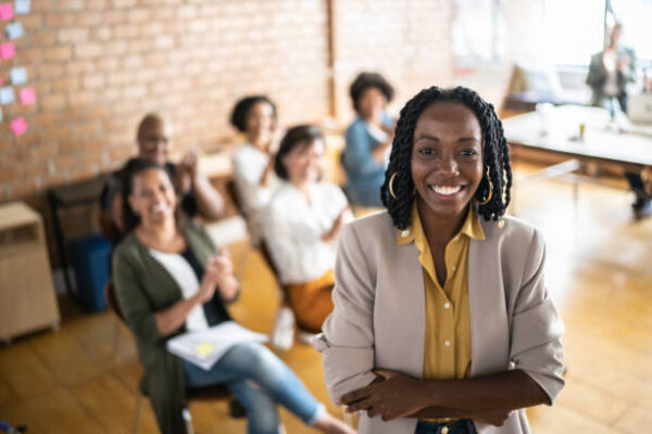 Portrait of businesswoman delivering a speech during a conference